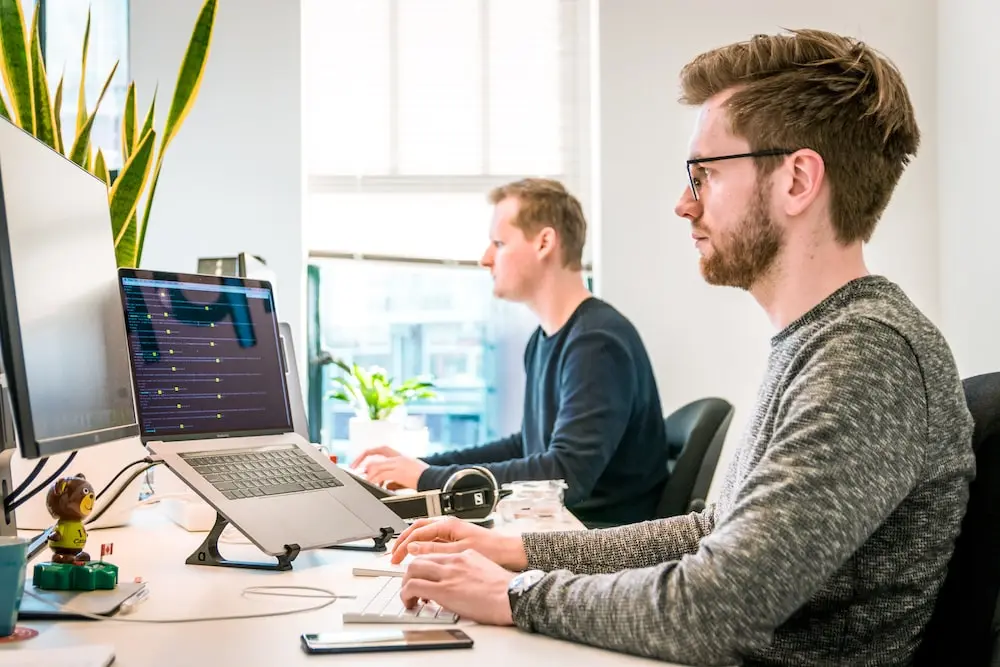 Immigration professionals working with ImmigrateTech software